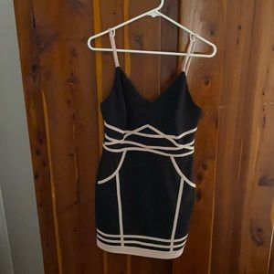 Boutique bought black body con dress with pink detail